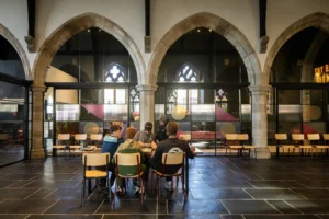 Youths participating in creative activities inside the renovated church, designed by Bradley McClure Architects.