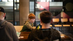 Group of young people exploring play and learning spaces within the refurbished Lighthouse Project.