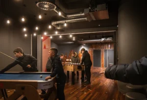 Kids playing inside the renovated St Michael’s Church, showing interactive youth and community spaces in Byker.
