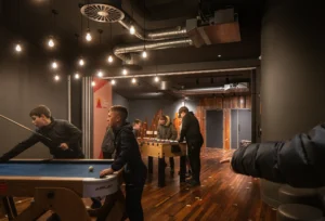 Kids playing inside the renovated St Michael’s Church, showing interactive youth and community spaces in Byker.