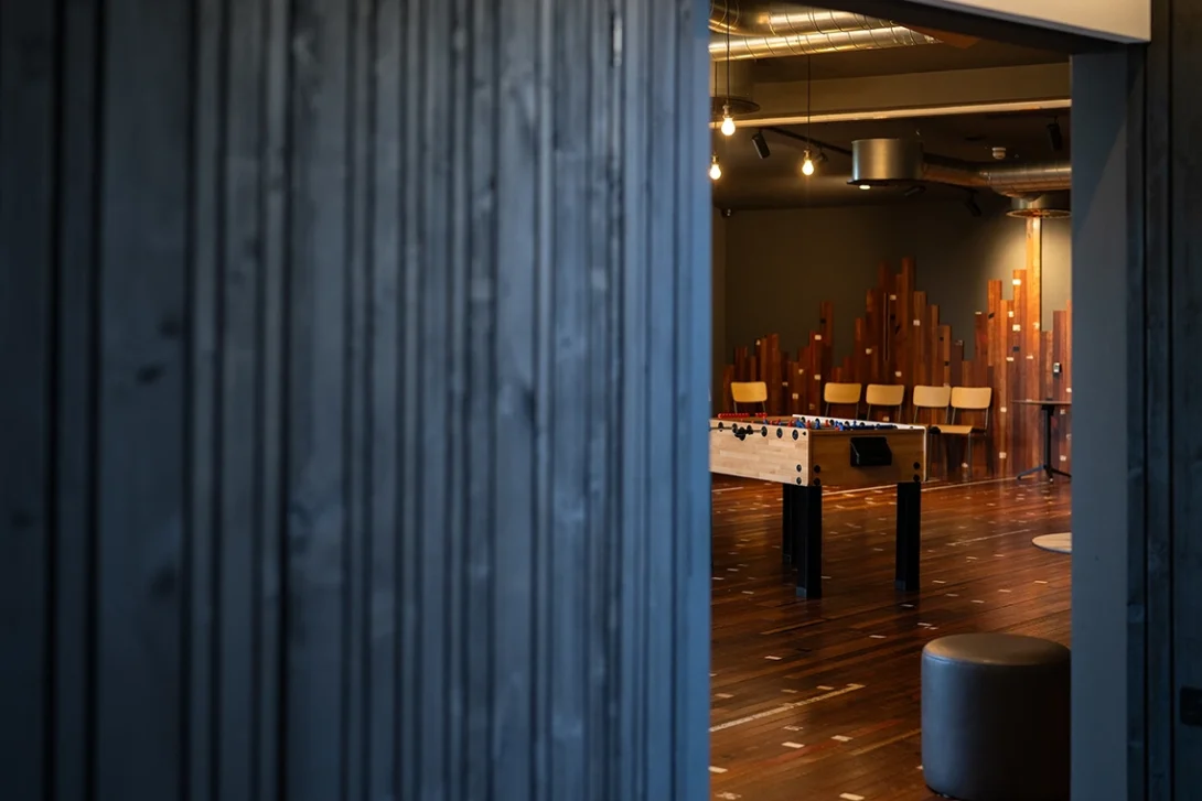 Interior of Lighthouse Project showing seamless blend of contemporary extension with historic church architecture.