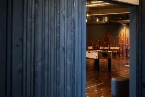 Interior of Lighthouse Project showing seamless blend of contemporary extension with historic church architecture.