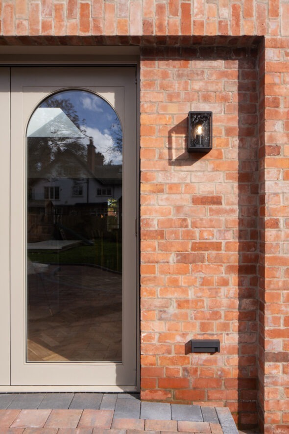 Contemporary glass extension opening the house to the garden — Belfast home renovation by Nest Architects.