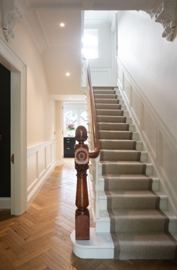 Contemporary kitchen and living area within a renovated Belfast home — modern family house architecture.