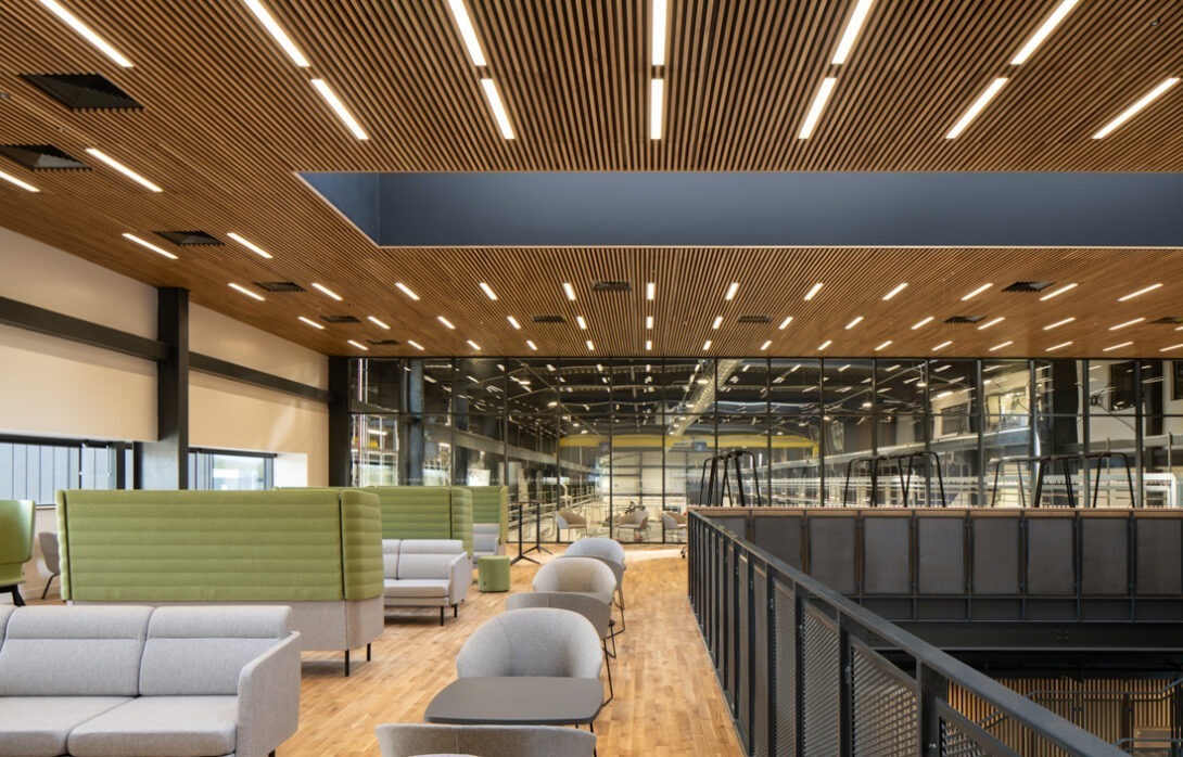 Interior architectural detail highlighting timber wall finishes and modern design elements at AMIC.