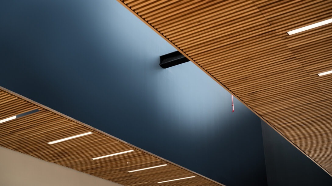 Contemporary office space within AMIC featuring modern furniture and collaborative work areas.