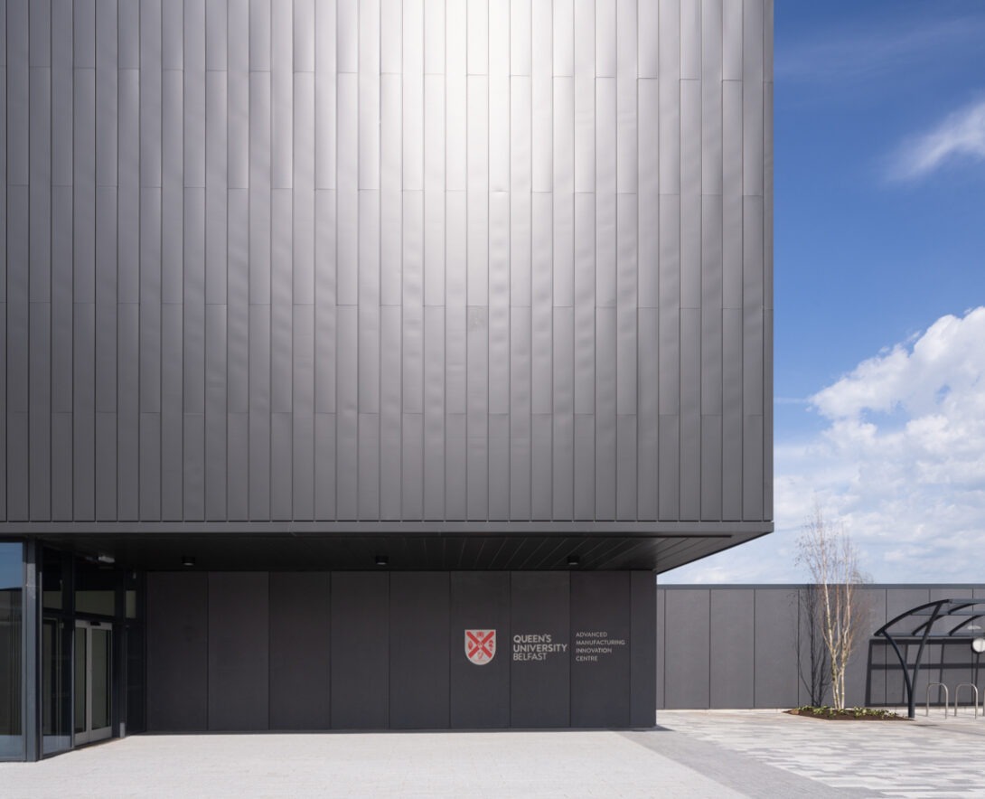 AMIC building exterior at Global Point Business Park featuring striking modern industrial design.