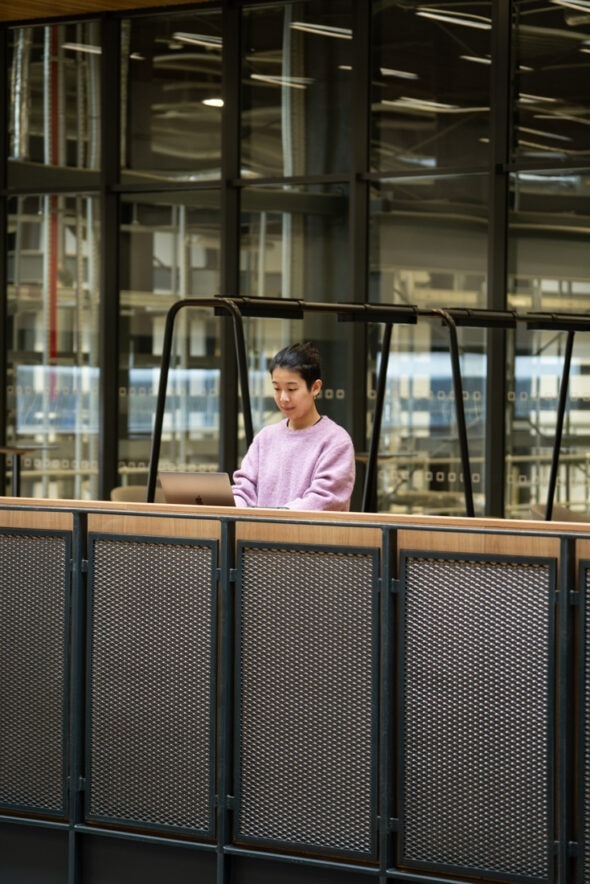 Large-scale manufacturing hall at AMIC showcasing flexible production and research environments.